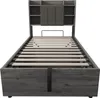 A bed frame with a headboard and storage compartments, shown from the front. Produktbild-Vorschau