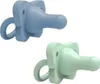 Two pacifiers, one blue and one green, are shown against a white background. Produktbild-Vorschau