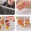 A collage of four images showing a grill set for an air fryer. Náhľad obrázku produktu
