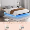 A bedroom scene featuring a bed with LED lighting underneath, a rug, and a robot vacuum cleaner. Produktbild-Vorschau