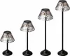Four solar-powered garden lights of varying heights are displayed against a white background. Produktbild-Vorschau