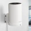 A white wall mount for a TP-Link Deco XE75 Mesh WLAN Router. Produktbild-Vorschau