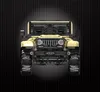 A front view of a yellow toy off-road jeep against a black grid background. Voir les images du produit