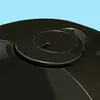 A close-up view of the top of a black electronic device. Anteprima dell’immagine prodotto