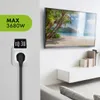 A digital timer plugged into a wall socket, with a TV displaying a tropical beach scene in the background. Náhľad obrázku produktu
