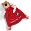 A plush teddy bear comforter with a red body and white accents, featuring a soccer ball and text. Produktbild-Vorschau