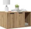 A wooden cabinet with two doors and an open shelf, decorated with a lamp, a plant, and a cup of coffee. Produktbild-Vorschau