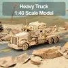 A wooden model of a heavy truck on a road with rocks and sand. Anteprima dell’immagine prodotto
