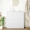 A white sideboard with drawers in a room with a plant and a coat rack. Náhled obrázku produktu