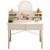 A vanity table with a mirror, drawers, shelves, and various cosmetic products. Podgląd zdjęcia produktu