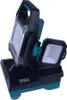 A black and teal cordless work lamp with two adjustable light heads is shown against a white background. Produktbild-Vorschau