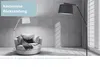A modern living room scene with two floor lamps and a comfortable armchair. Produktbild-Vorschau