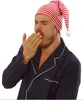 A man wearing a striped nightcap and pajamas yawns. Anteprima dell’immagine prodotto