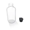 A clear glass milk carafe and its black lid are shown on a white background. Produktbild-Vorschau