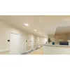 A hospital corridor with doors and a reception desk. Produktbild-Vorschau