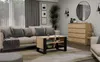 A modern living room scene featuring a couch, coffee table, and dresser. Voir les images du produit