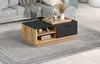A modern living room scene featuring a coffee table in front of a sofa. Voir les images du produit