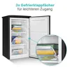 A close-up view of the interior of a small black freezer, showing its transparent drawers filled with frozen food. A magnified inset highlights the drawer mechanism and contents. Produktbild-Vorschau