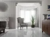 A bright, minimalist living room with a fireplace, armchair, and a large plant. Produktbild-Vorschau