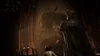 A child-like figure stands before a large, imposing figure in a dark, atmospheric setting, possibly a throne room or temple. Produktbild-Vorschau