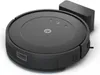 A robot vacuum cleaner is shown on a white background, connected to its charging dock. Voir les images du produit