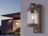 A modern house with an outdoor wall light. Náhled obrázku produktu