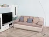 A living room scene with a sofa, TV, and a floor lamp. Náhled obrázku produktu
