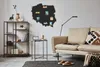 A living room scene featuring a wall map of Poland with magnets and a sofa. Podgląd zdjęcia produktu