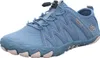 A single blue athletic shoe is shown against a white background. Podgląd zdjęcia produktu