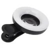 A close-up studio shot of a clip-on ring light for a phone camera. Produktbild-Vorschau