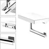 A chrome toilet paper holder with a glass shelf. Produktbild-Vorschau