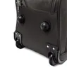 Close-up view of the bottom corner of a dark gray rolling suitcase, showing two black wheels and two black protective feet. Náhled obrázku produktu