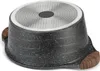 The bottom of a speckled black pot with wooden handles and a textured metallic base. Produktbild-Vorschau