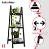 A black wooden plant stand with plants and decorative items on display, accompanied by marketing graphics and text. Produktbild-Vorschau