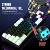 A robotic hand pressing a key on a colorful RGB keyboard. Produktbild-Vorschau