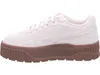 A side view of a beige Puma sneaker with a brown platform sole, isolated on a white background. Produktbild-Vorschau