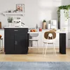 A modern kitchen scene featuring a black kitchen island with a pull-out table and chairs. Náhled obrázku produktu