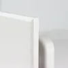A close-up shot of a white corner of a product against a white background. Produktbild-Vorschau