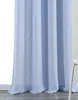 A close-up view of a light blue curtain with vertical folds, showing its texture and how it drapes. Produktbild-Vorschau