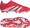 A pair of red Adidas Predator children's soccer cleats shown from the side and from the sole. Produktbild-Vorschau