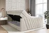 A bedroom scene with a bed that has its storage compartment open. Produktbild-Vorschau