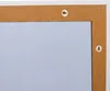 Close-up of the back of a white framed mirror, showing the backing material and hanging hardware. Náhľad obrázku produktu
