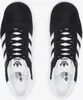 A top-down view of a pair of black and white Adidas Gazelle sneakers. Produktbild-Vorschau