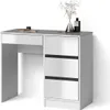 A white vanity table with drawers and a drawer on the left side, placed against a white background. A vase with flowers and a bottle of perfume are on top of the table. Voir les images du produit