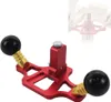 A red aluminum alloy woodworking plane with black handles and gold accents is shown against a white background. A smaller, faded inset image shows the tool in use with wood. Produktbild-Vorschau