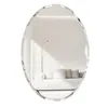 A reflection of a modern living room with a sofa and a floor lamp in an oval mirror. Podgląd zdjęcia produktu