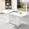 A white extendable dining table is shown in a well-lit room with a large window overlooking a garden. Produktbild-Vorschau