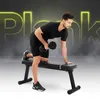 A man is performing a dumbbell row exercise on a black weight bench. Náhľad obrázku produktu