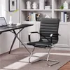 An office chair is placed next to a desk in a room with a bookshelf in the background. Produktbild-Vorschau