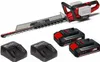 A collection of a hedge trimmer, batteries, and chargers against a white background. Produktbild-Vorschau